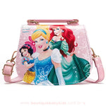Bolsa infantil das Princesas Disney na cor rosa claro, com design delicado e alça dourada ajustável.