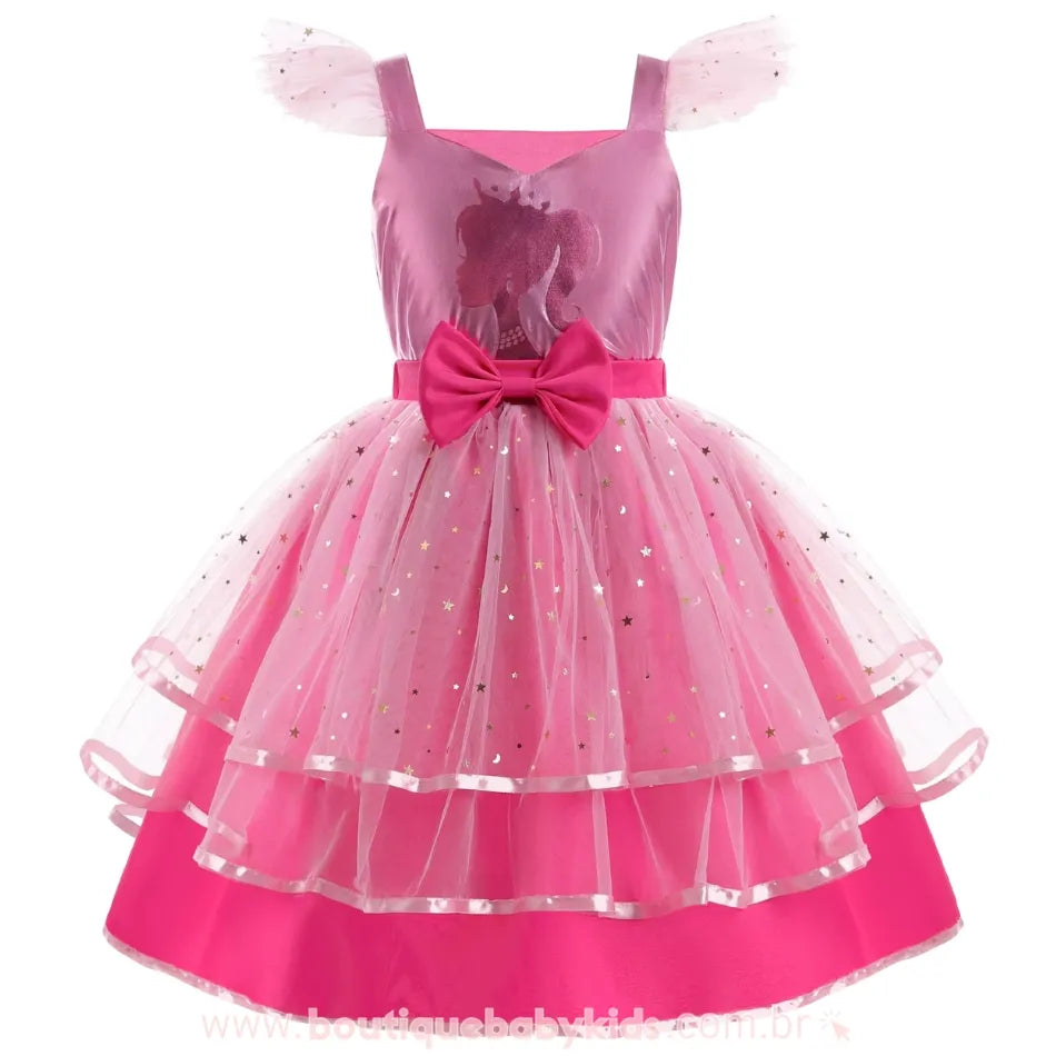 Vestido infantil Barbie Glamour Rosa visto de frente, com saia rodada em camadas, tecido reluzente e laço decorativo na cintura.