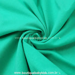 Detalhe do tecido macio e confortável do Vestido Infantil Temático Princesa Jasmine, em tom verde esmeralda, ideal para fantasia infantil elegante.