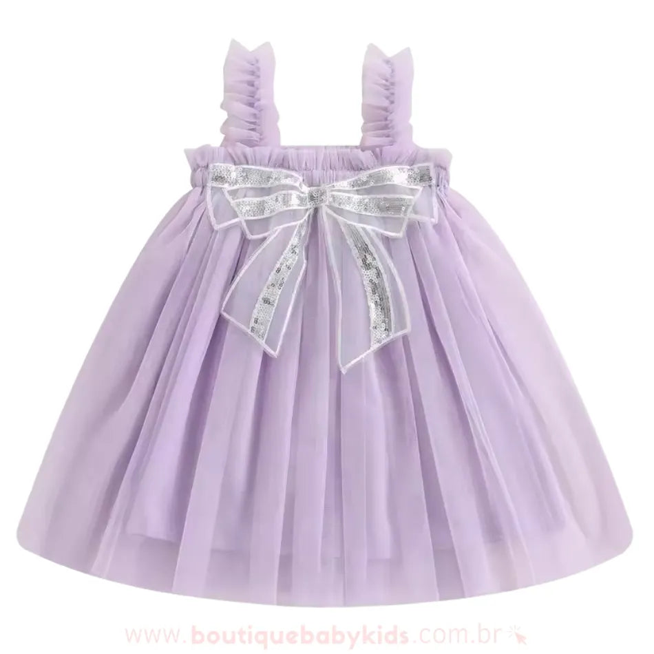 Vestido Infantil Tule Laço de Paetês cor lilás, com tule volumoso e laço brilhante, disponível na Boutique Baby Kids.