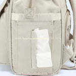 Bolso lateral com abertura especial para lenços umedecidos, proporcionando praticidade no dia a dia.