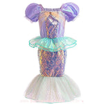 Conjunto infantil fantasia de sereia com saia de paetês e detalhe em tule verde, manga bufante lilás e acabamento com brilho.
