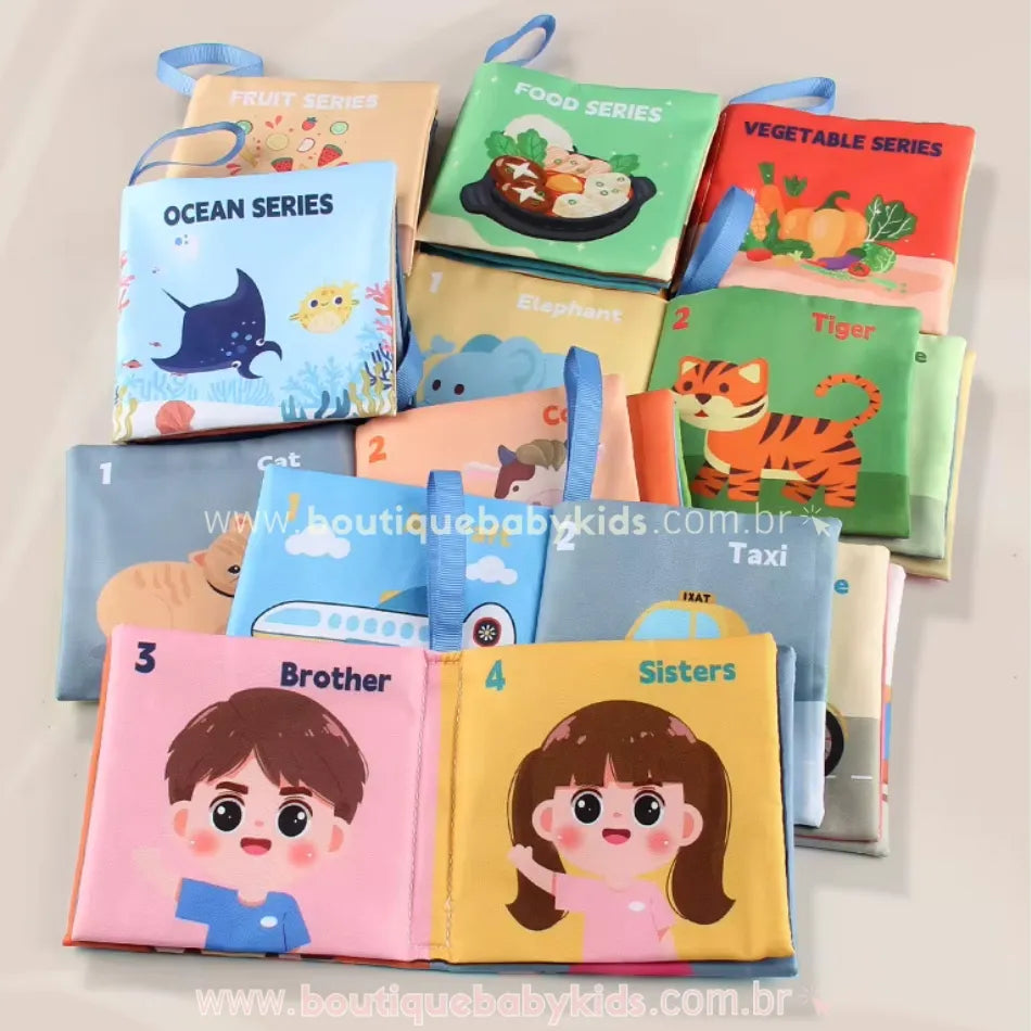 Conjunto de livros sensoriais para bebês, organizados em fileira. Capa de cada livro apresenta ilustrações vibrantes com temas como alimentos, transporte, frutas e animais.